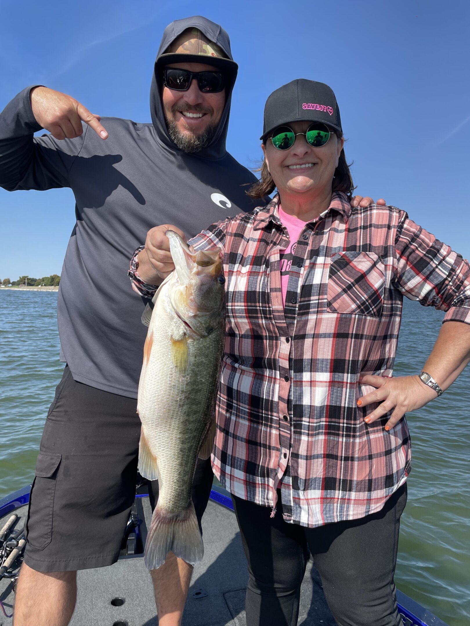 Friends celebrate fishing success together