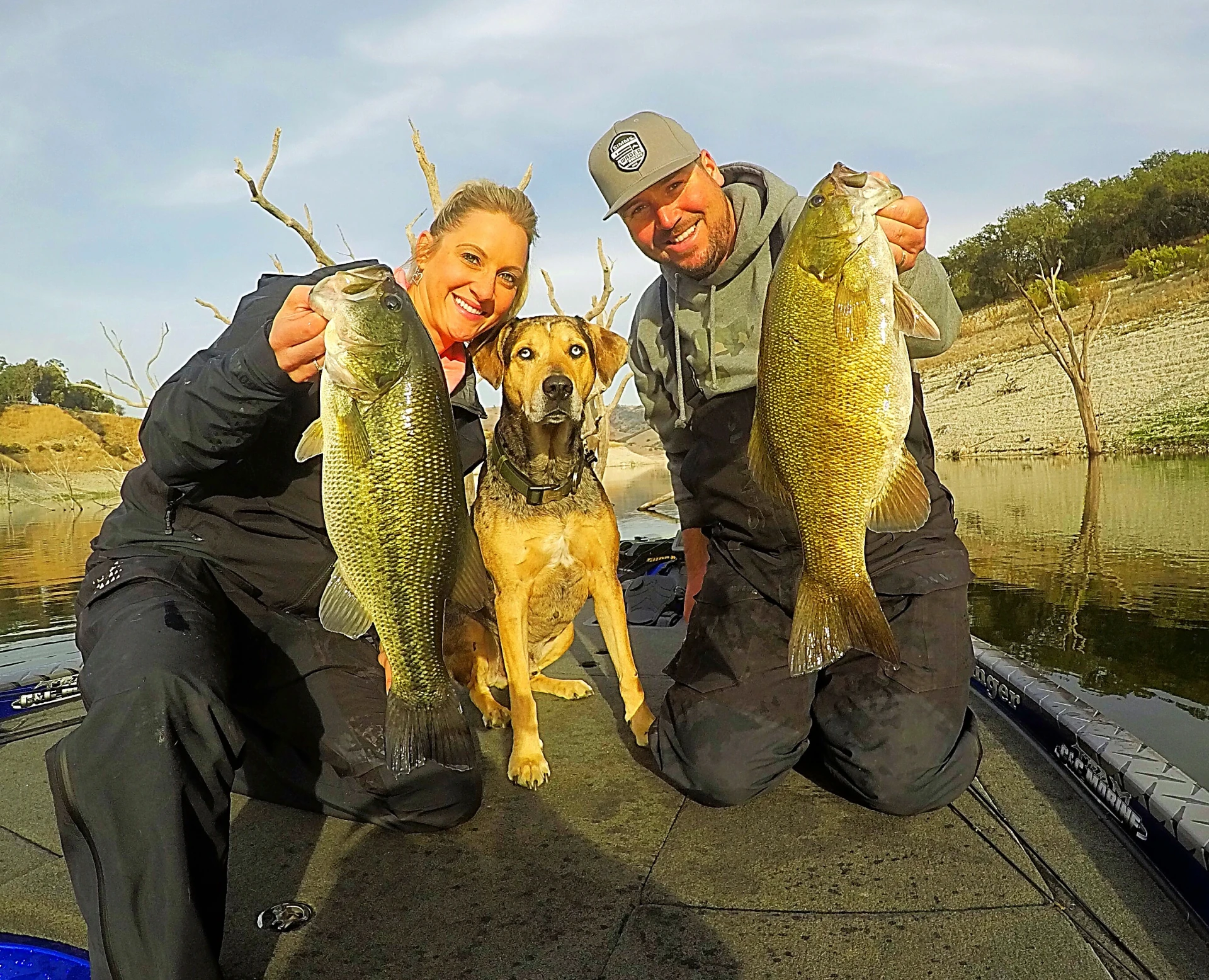 Happy anglers showing off fish